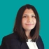 Consultant headshot of Mahwash Babar, on a green background