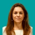 Headshot of consultant Mara Kyrgiou on a green background