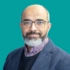 Headshot of consultant Mostafa Elgohary on a green background
