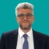 Headshot of consultant Constantinos Parisinos