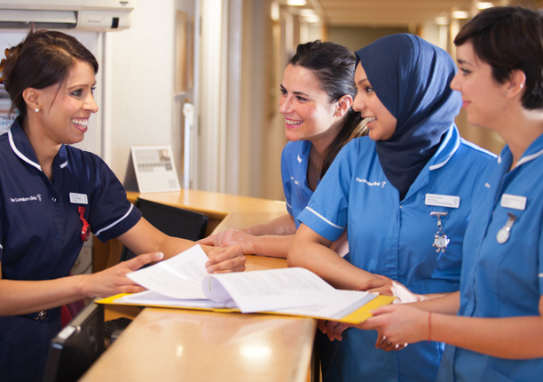 Nurses around desk