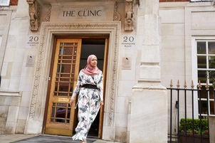 An international patient walking out of the door