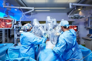 Surgeons performing robotic surgery