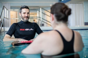 Physio and patient in pool