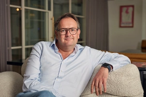 Charlie Bradshaw sitting on couch