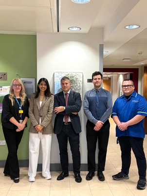 A photo of the team at the London Clinic who launched the new antibody therapy lung cancer treatment. Smiling and happy looking at camera celebrating success