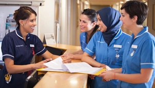 Nurses around desk