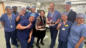 The aquablation team celebrating with cake