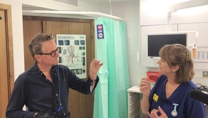An image of Dr Michael Mosley at The London Clinic, holding a small capsule endoscopy and camera, to check on his bowel health. Featuring a London Clinic nurse