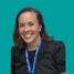 A headshot of consultant Vivian Elwell, on a green background.