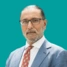 Headshot of consultant Ranjeev Bhangoo, on a green background