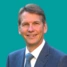 A headshot of consultant Simon Wood