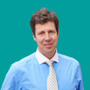Headshot of Al Russell, CEO of The London Clinic on a light green background
