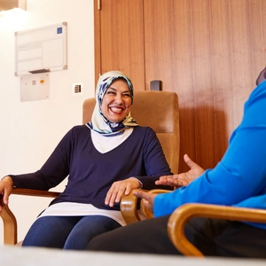 Patient laughing with a member of staff