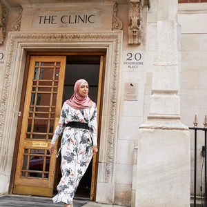 An international patient walking out of the door