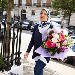 Visitor with flowers