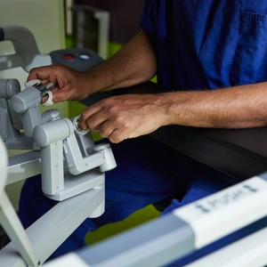 A surgeon conducting robotic surgery