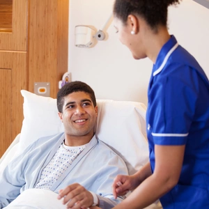 A nurse looking after a patient