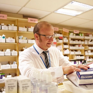 Pharmacist organising medication