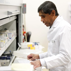 Pharmacist arranging a patients medication