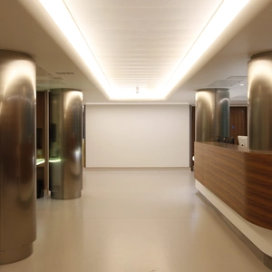 An image of a desk area and corridor