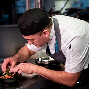 One of our team preparing a meal