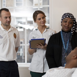 Image of staff talking to patient