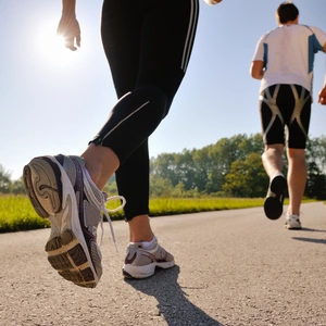 Two people running