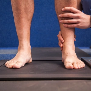 Young man on study of the tread in a podiatry cabinet