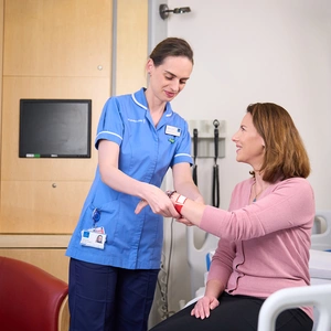 An expert from The London Clinic attending to a patient