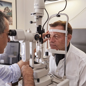 Image of a patient having their eyes checked by an optometrist at The London Clinic Eye Centre