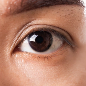 An image of a woman's eye with a macro close-up 