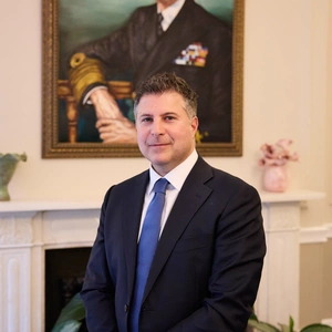 A photo of Dr Dionysis Papadatos-Pastos in the King's Speech Room, at The London Clinic