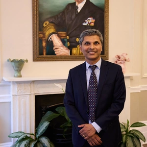 A photo of Dr Hemal Ariyaratne in the King's Speech Room, at The London Clinic